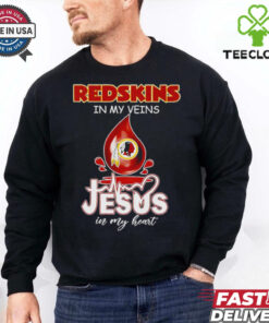 The **Official Redskins in My Veins, Jesus in My Heart Shirt** combines team pride with personal faith, expressing a deep connection to both the Washington Redskins and a spiritual devotion. Perfect for fans who want to showcase their love for the team while reflecting their values.