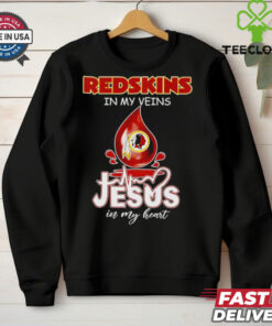 The **Official Redskins in My Veins, Jesus in My Heart Shirt** combines team pride with personal faith, expressing a deep connection to both the Washington Redskins and a spiritual devotion. Perfect for fans who want to showcase their love for the team while reflecting their values.