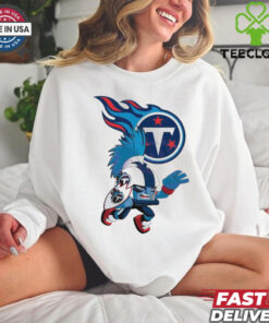 Official Rush Zone Tennessee Titans NFL Cartoon Character 2025 Shirt, featuring a dynamic and fun design of the Titans' Rush Zone character in action, set against bold team colors and logos. A perfect blend of NFL fandom and cartoon charm, this unisex shirt celebrates the Tennessee Titans' spirit for the 2025 season. Ideal for fans of all ages to showcase their team pride with a playful twist!