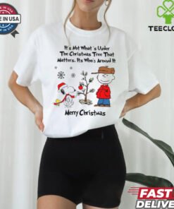 Official Snoopy Charlie Brown And Woodstock It’s Not What’s Under The Tree That Matters It’s What’s Around It Merry Christmas 2024 Shirt