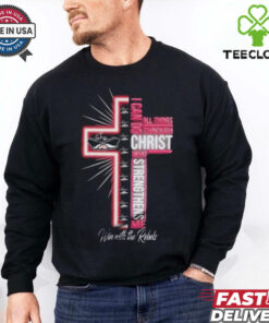 The **Official UNLV Rebels I Can Do All Things Through Christ 2025 T-shirt** likely combines school spirit and a faith-based message. The design probably features the UNLV Rebels logo, representing the university's athletic teams, alongside the inspirational quote 