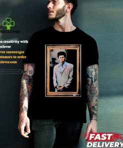 Official Ump is wearing a kramer T shirt