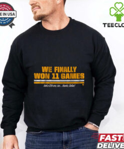 Official Washington Commanders NFL Football We Finally Won 11 Games And A 12th One Too Thanks Dallas T-Shirt with a playful and celebratory design, perfect for Commanders fans highlighting their victories, especially over Dallas.