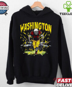 The **Official Washington Commanders Skeleton Football Player T-Shirt** features a bold, edgy design with a skeleton football player representing the Commanders. Perfect for fans who want to showcase their team spirit in a unique and fun way, this shirt combines football with a touch of Halloween-style flair!