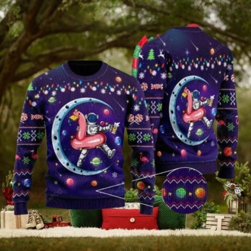 Party Astronauts Sit On Flamingo Floats At A Space Ugly Christmas Sweater Party