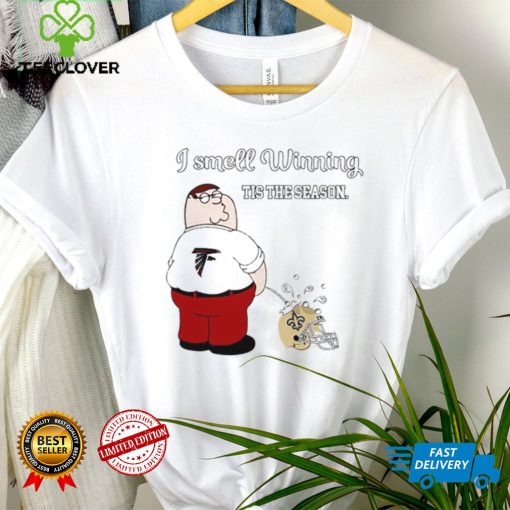 Peter Griffin Atlanta Falcons I smell winning tis the season peeing on New Orleans Saints helmet hoodie, sweater, longsleeve, shirt v-neck, t-shirt