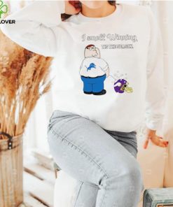 Peter Griffin Detroit Lions peeing on Minnesota Vikings helmet I smell winning tis the season hoodie, sweater, longsleeve, shirt v-neck, t-shirt