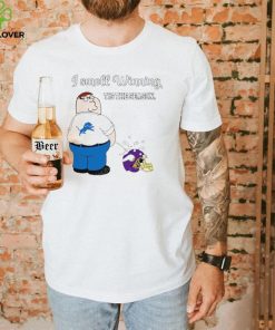 Peter Griffin Detroit Lions peeing on Minnesota Vikings helmet I smell winning tis the season hoodie, sweater, longsleeve, shirt v-neck, t-shirt