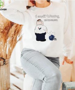 Peter Griffin Houston Texans peeing on Indianapolis Colts helmet I smell winning tis the season shirt 1 Peter Griffin Houston Texans peeing on Indianapolis Colts helmet I smell winning tis the season shirt