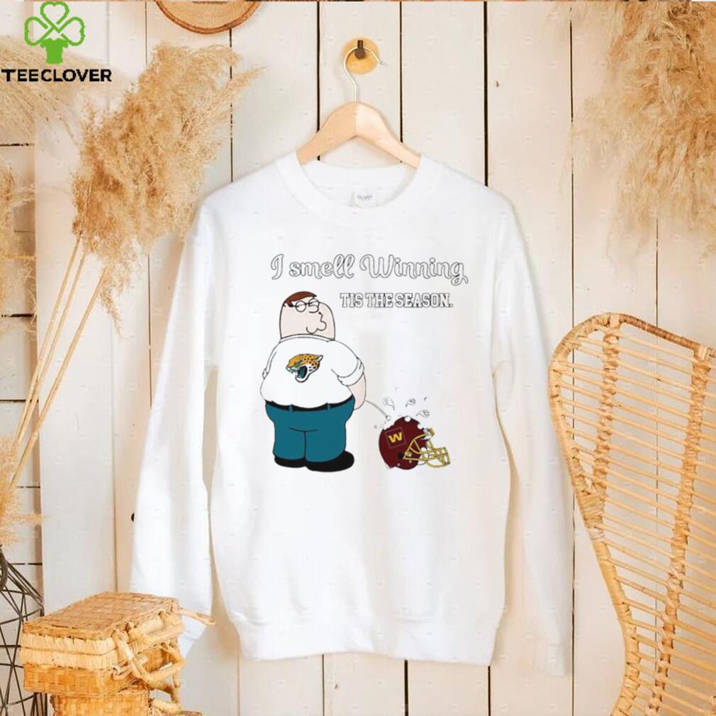 Peter Griffin Jacksonville Jaguars peeing on Washington Commanders helmet I smell winning tis the season shirt