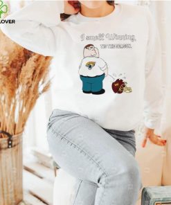 Peter Griffin Jacksonville Jaguars peeing on Washington Commanders helmet I smell winning tis the season shirt 1 Peter Griffin Jacksonville Jaguars peeing on Washington Commanders helmet I smell winning tis the season shirt