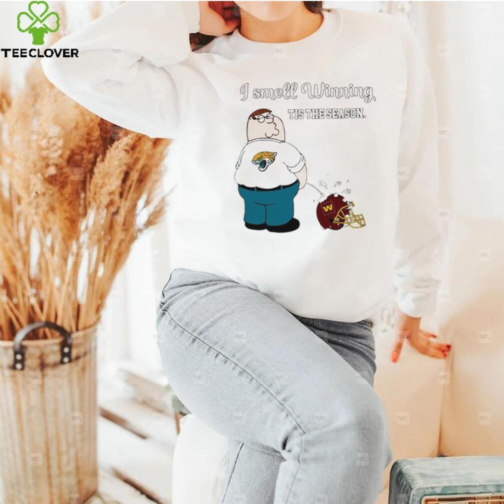 Peter Griffin Jacksonville Jaguars peeing on Washington Commanders helmet I smell winning tis the season shirt Peter Griffin Jacksonville Jaguars peeing on Washington Commanders helmet I smell winning tis the season shirt