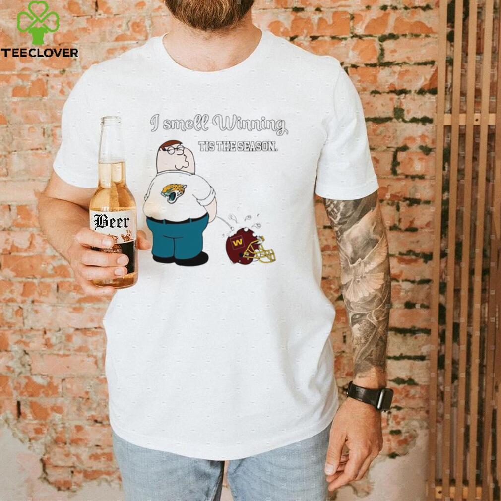 Peter Griffin Jacksonville Jaguars peeing on Washington Commanders helmet I smell winning tis the season shirt Peter Griffin Jacksonville Jaguars peeing on Washington Commanders helmet I smell winning tis the season shirt