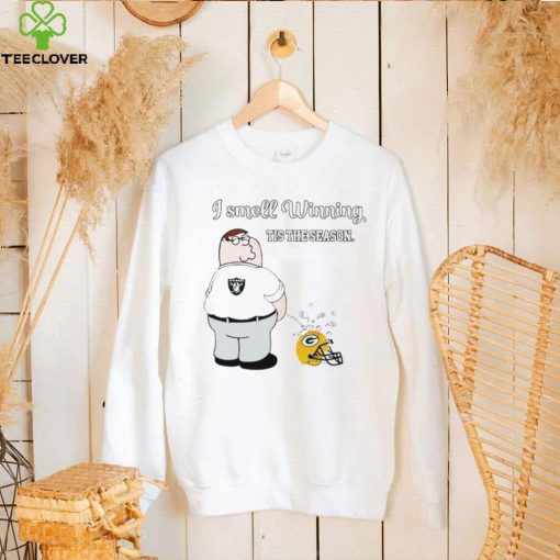 Peter Griffin Las Vegas Raiders peeing on Green Bay Packers helmet I smell winning tis the season hoodie, sweater, longsleeve, shirt v-neck, t-shirt