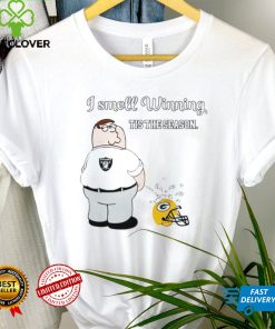 Peter Griffin Las Vegas Raiders peeing on Green Bay Packers helmet I smell winning tis the season hoodie, sweater, longsleeve, shirt v-neck, t-shirt