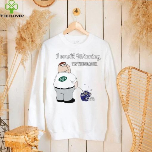 Peter Griffin New York Jets peeing on Baltimore Ravens helmet I smell winning tis the season hoodie, sweater, longsleeve, shirt v-neck, t-shirt