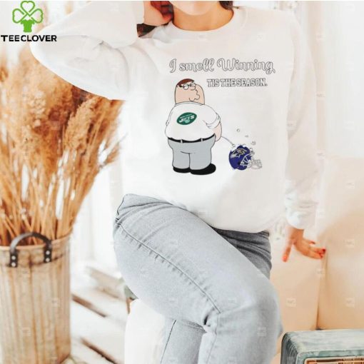 Peter Griffin New York Jets peeing on Baltimore Ravens helmet I smell winning tis the season hoodie, sweater, longsleeve, shirt v-neck, t-shirt