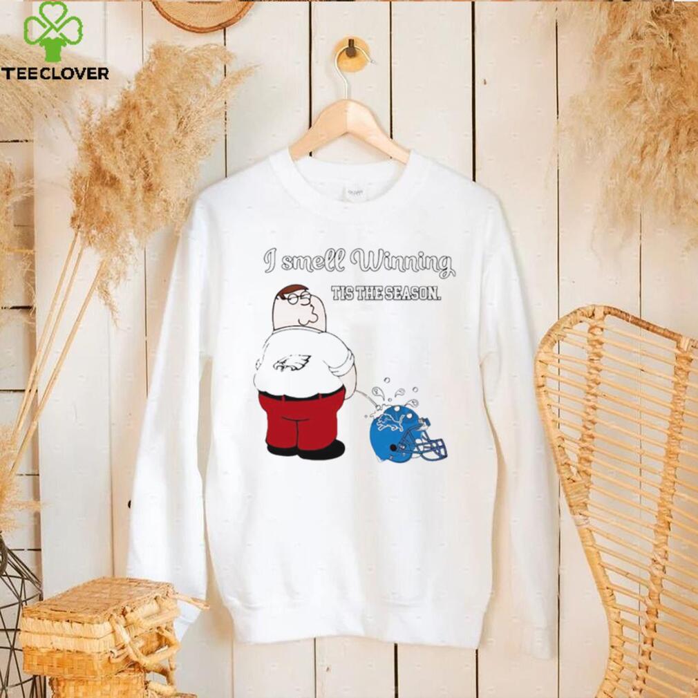 Peter Griffin Philadelphia Eagles I smell winning tis the season peeing on Detroit Lions helmet shirt