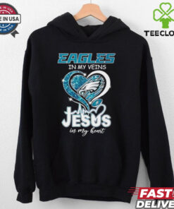 The **Philadelphia Eagles In My Veins Jesus In My Heart Shirt** combines team pride with a powerful spiritual message. A great way for Eagles fans to showcase their love for both the team and their faith!