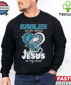 The **Philadelphia Eagles In My Veins Jesus In My Heart Shirt** combines team pride with a powerful spiritual message. A great way for Eagles fans to showcase their love for both the team and their faith!