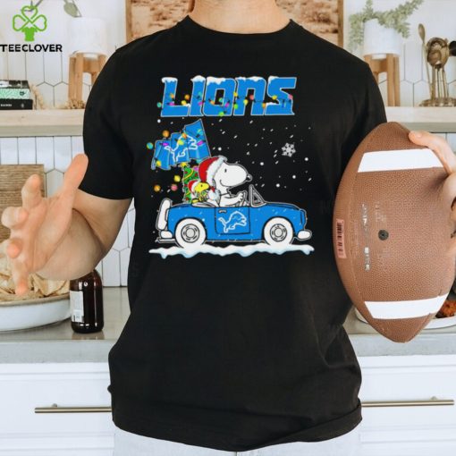 Happy Merry Christmas Snoopy drive a car Detroit Lions logo flag gift hoodie, sweater, longsleeve, shirt v-neck, t-shirt