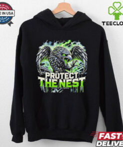 Protect the Nest Seattle Seahawks Shirt, celebrating the team's defense and strength with a bold design inspired by the Seahawks' iconic spirit.
