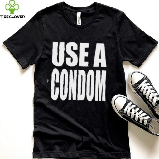 Rihanna’s USE A Condom Shirt