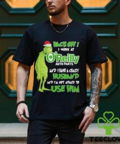 Santa Grinch back off I work at O’reilly and I have a crazy husband and I’m not afraid to use him Christmas shirt