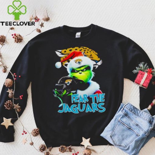 Santa Grinch fear the Jacksonville Jaguars NFL hoodie, sweater, longsleeve, shirt v-neck, t-shirt