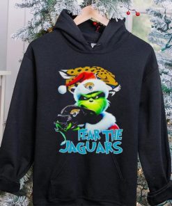 Santa Grinch fear the Jacksonville Jaguars NFL hoodie, sweater, longsleeve, shirt v-neck, t-shirt