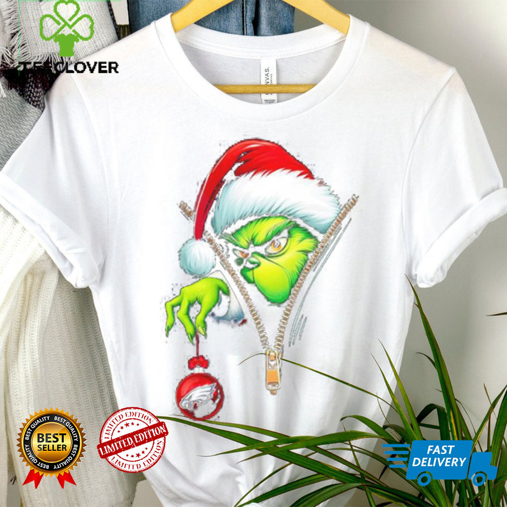 Santa Grinch insdie zipper holding Philadelphia Eagles shirt Santa Grinch insdie zipper holding Philadelphia Eagles shirt