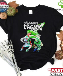 Saquon Barkley Philadelphia Eagles Graphic NFL Shirt, featuring a dynamic design showcasing Saquon Barkley in his Philadelphia Eagles gear. Perfect for fans who support Barkley and the Eagles, combining his powerful presence with a bold NFL graphic.