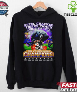 Steel Cracked, Tigers Tamed, Dogs Caged 2024 AFC North Division Champions Shirt with a bold design celebrating the Ravens' victory in the division, perfect for fans showcasing their team's dominance over rivals.