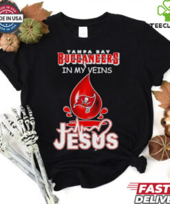Tampa Bay Buccaneers in My Veins, Jesus in My Heart Blood Drop Shirt featuring a powerful design that blends football passion with deep faith. Show your unwavering support for the Buccaneers and your spiritual beliefs with this unique, meaningful apparel.
