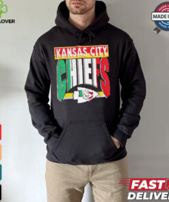 Taylor wearing Kansas City Chiefs Mexican style shirt