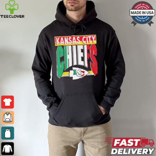Taylor wearing Kansas City Chiefs Mexican style shirt