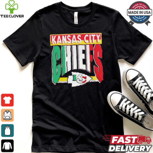 Taylor wearing Kansas City Chiefs Mexican style shirt