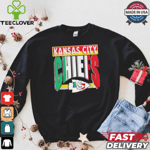 Taylor wearing Kansas City Chiefs Mexican style shirt