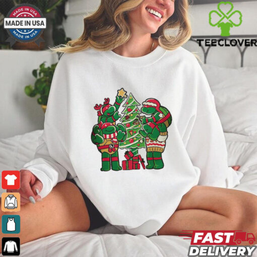 Teenage Mutant Ninja Turtles decorating their Christmas tree shirt