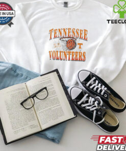 The **Tennessee Volunteers Basketball Champion Go Big Orange Vintage Shirt** features a classic, retro-inspired design celebrating the Tennessee Volunteers' basketball championship victory. With the iconic 
