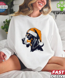 Tennessee Volunteers Tennessee Smokey Claus Shirt festive holiday design featuring the Tennessee Volunteers mascot, Smokey, dressed as Santa Claus