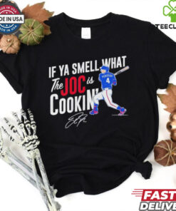 Texas Rangers Joc Pederson If Ya Smell What the Joc is Cookin' Signature Shirt featuring a fun, bold design that plays on the popular phrase with a nod to Joc Pederson's unique style. Show your support for the Rangers and Pederson with this signature, fan-favorite apparel.