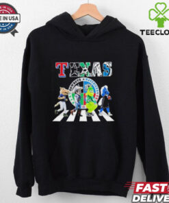 Texas Sports Team Mascots Abbey Road Shirt, featuring a fun design inspired by the iconic Abbey Road album cover, with mascots from Texas sports teams walking across the street. Perfect for fans of Texas teams with a creative twist!