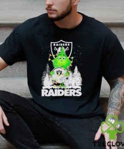 The Baby Grinch hugging Las Vegas Raiders helmet snowy forest Christmas shirt