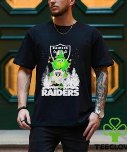 The Baby Grinch hugging Las Vegas Raiders helmet snowy forest Christmas hoodie, sweater, longsleeve, shirt v-neck, t-shirt