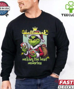 The Grinch Hallmark Making The Best Memories Merry Christmas Shirt with a heartwarming holiday design.