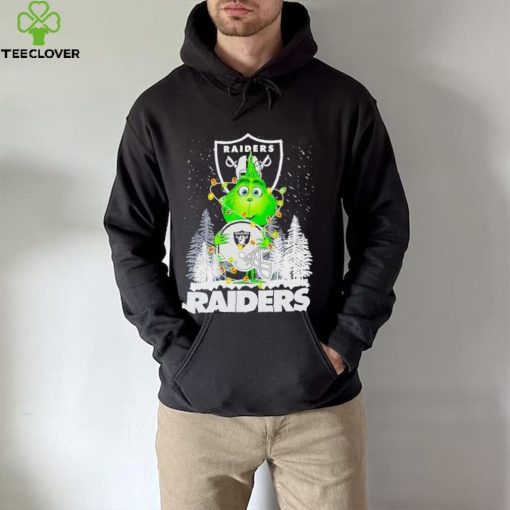The Grinch hug Las Vegas Raiders helmet Christmas shirt