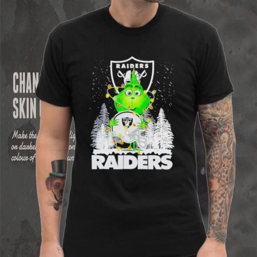 The Grinch hug Las Vegas Raiders helmet Christmas shirt