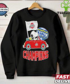 The Peanuts Snoopy and Woodstock Ohio State Buckeyes Goodyear Cotton Bowl Classic Champions T-shirt honors the Buckeyes' 2024-2025 College Football Playoff victory in a fun, fan-favorite design.