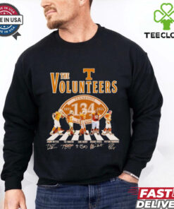 The Volunteers 1891-2025 Abbey Road Signatures Shirt featuring a unique design inspired by the iconic Abbey Road album cover, with signatures from key figures of the Tennessee Volunteers football team, celebrating their rich history from 1891 to 2025.